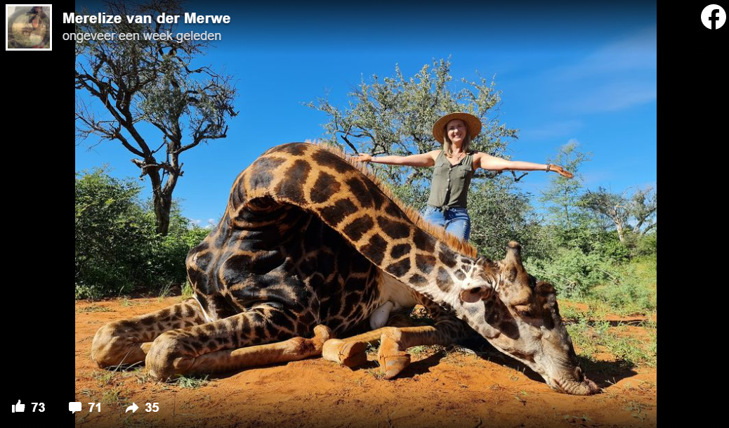 jaagster poseert met giraf